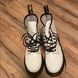 White and black lined Dr. Martens
